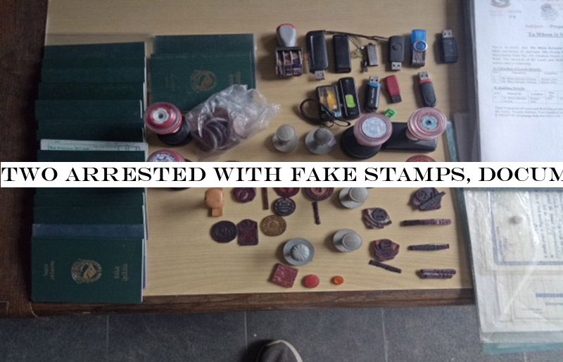 Two arrested with fake stamps, documents