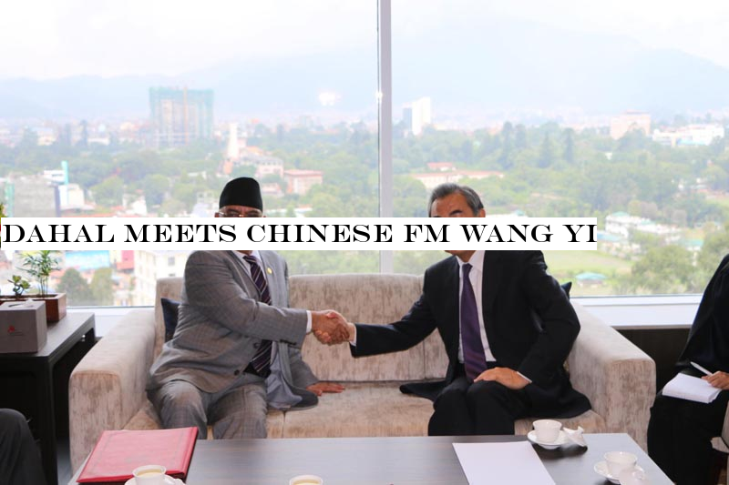 Dahal meets Chinese FM Wang Yi