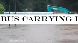 Bus carrying passengers swept away in floodwaters
