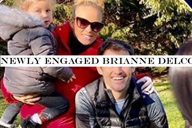 Newly engaged Brianne Delcourt beams with new fiance Kevin Kilbane and daughter Gracie