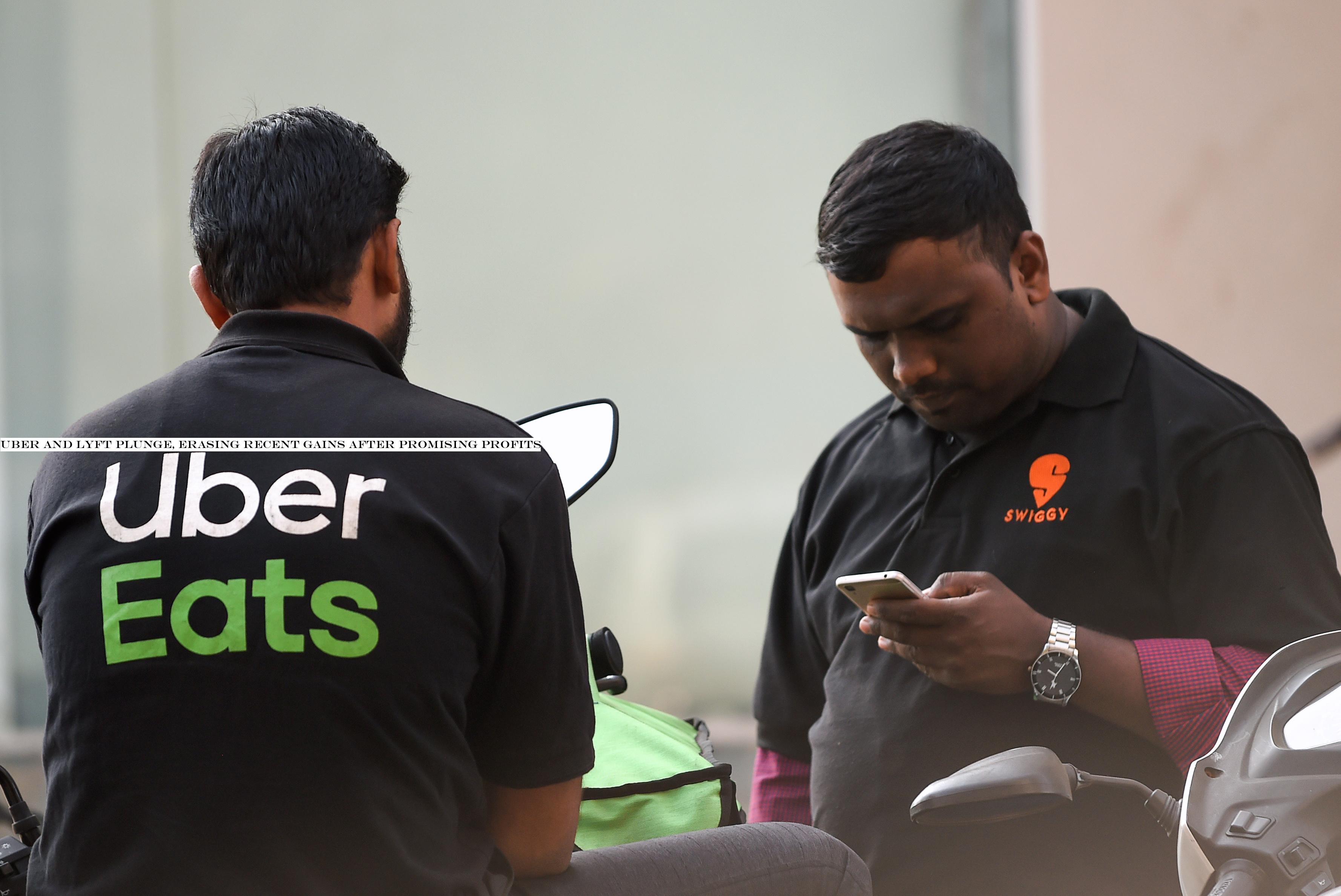 Uber and Lyft plunge, erasing recent gains after promising profits