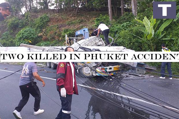 Rescue volunteers rush to help the driver and passengers of a truck after it rammed into a power pole in Muang district of Phuket province on Saturday. (Photo by Achadtaya Chuenniran) Two killed in Phuket accident