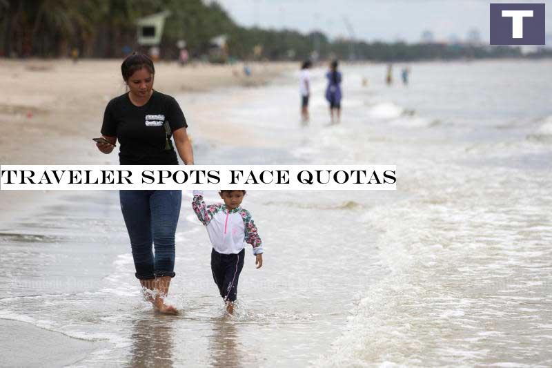 Visitors stroll along Bang Saen beach in Chon Buri province which opened on Monday after closing for two months to prevent Covid-19 transmission. (Photo by Wichan Charoenkiatpakul) Tourist spots face quotas