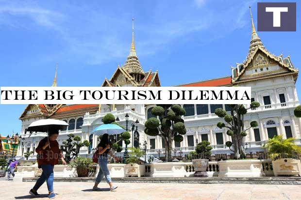 Only a small number of visitors are seen at the Grand Palace on Saturday as the tourist attraction reopens after being shut for regarding two months due to the Covid-19 pandemic. (Photo by Wichan Charoenkiatpakul) The big tourism dilemma