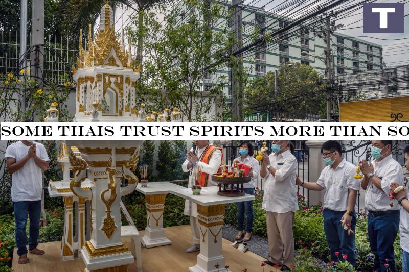 Kitsana Phattharasirisap, a spiritual consultant (centre), prays during a consecration ceremony for a spirit house at a new condominium complex in Bangkok, May 18, 2020. (Adam Dean/The New York Times) Some Thais trust spirits more than social distancing