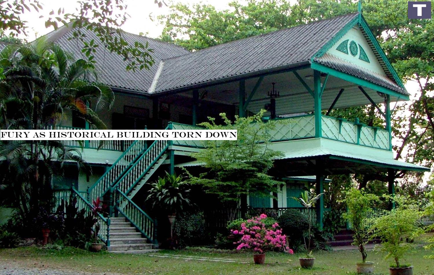 The 127-year-old building in Phrae is seen before it was torn down, triggering an uproar among local residents and conservation groups. The building used to house the offices of a British company which won a logging concession in the province more than a century ago.â-#128;-#137;Subin Khuenkaew Fury as historical building torn down