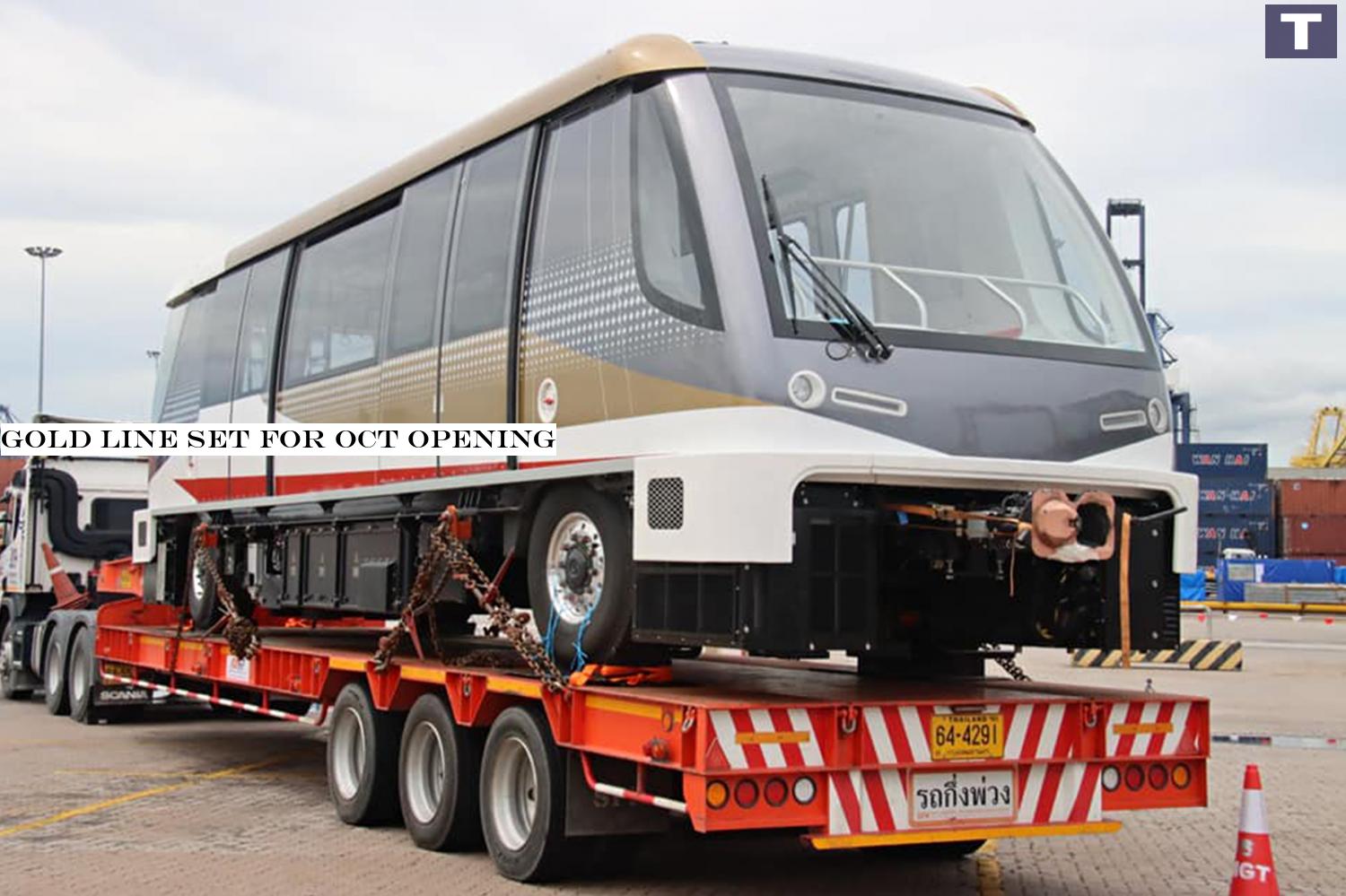 The first of the Bombardier Innovia APM 300 electric trains from China arrives on Thursday at Laem Chabang Port in Chon Buri. Two other trains are expected to arrive in August. Gold Line set for Oct opening