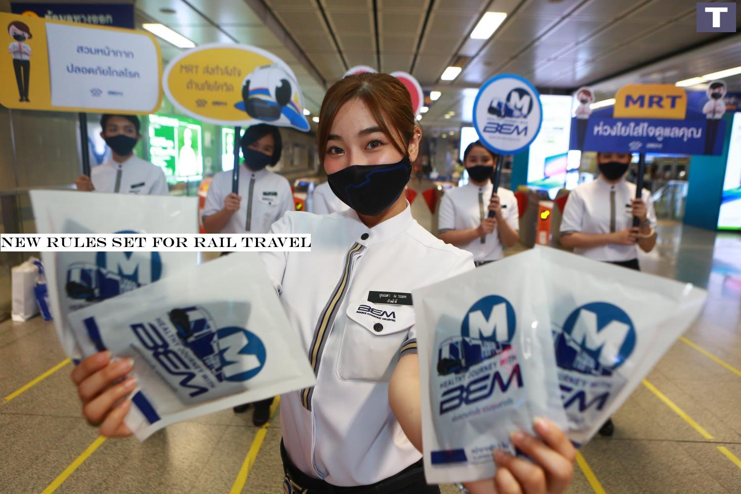 A group of BEM employees showcase the company's MRT safety campaign aimed at educating the public about Covid-19.â-#128;-#137;Somchai Poomlard New rules set for rail travel