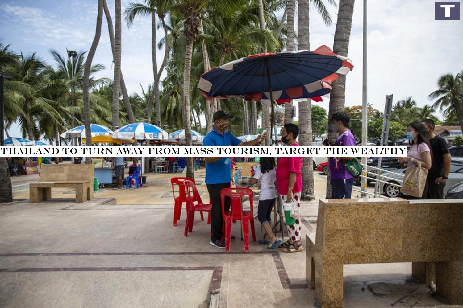Back to the beaches: A visitor wearing a protective mask has her temperature checked at an entrance screening point at Bangsaen beach in Chonburi last Sunday. (Photo: Bloomberg) Thailand to turn away from mass tourism, target the wealthy
