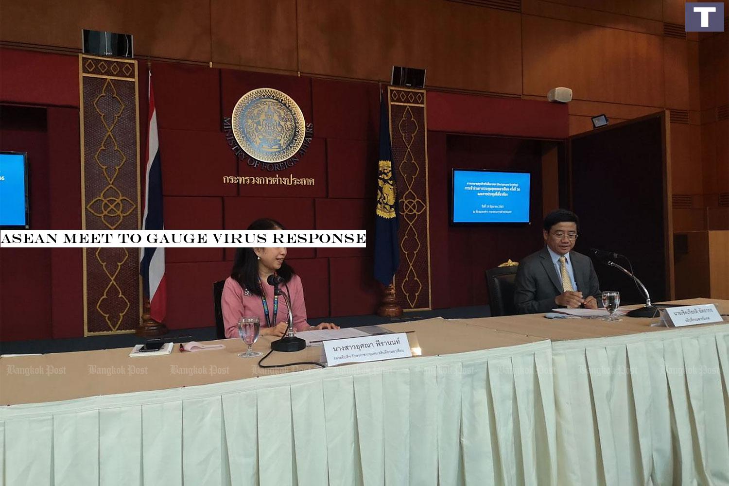 Usana Berananda, Department of Asean Affairs' acting director-general, left, and Cherdkiat Atthakor, Ministry of Foreign Affairs' spokesman hold a press conference on the upcoming Asean Summit.â-#128;-#137;(Photo by Kornchanok Raksaseri) Asean meet to gauge virus response