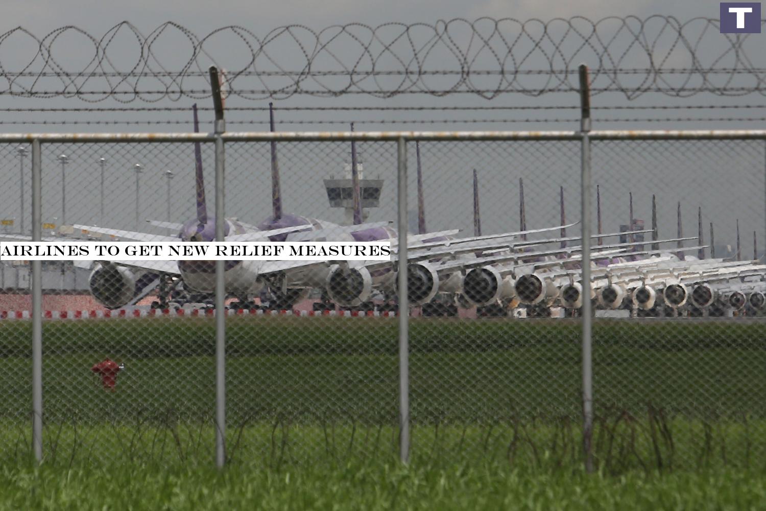Thai Airways airplanes are seen parked on the tarmac at Suvarnabhumi airport. The Civil Aviation Authority of Thailand has laid out further measures to help airlines cope with the Covid-19 pandemic.â-#128;-#137;Wichan Charoenkiatpakul Airlines to get new relief measures