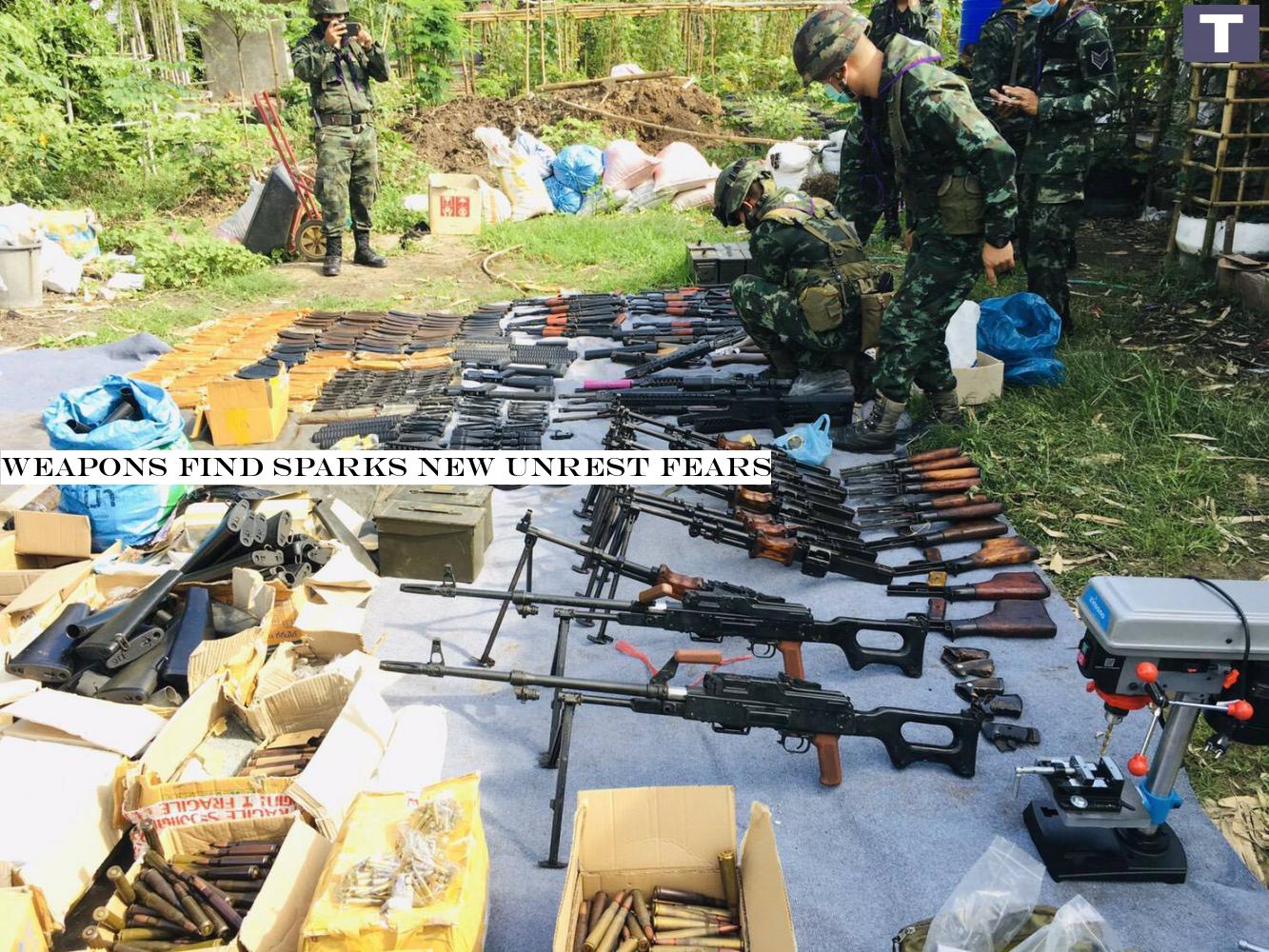 Soldiers display weapons and ammunition found at a home in Tak's Mae Sot district on Tuesday. The weapons are suspected to be part of a plot to stir up political unrest.â-#128;-#137;POLICE PHOTO Weapons find sparks new unrest fears