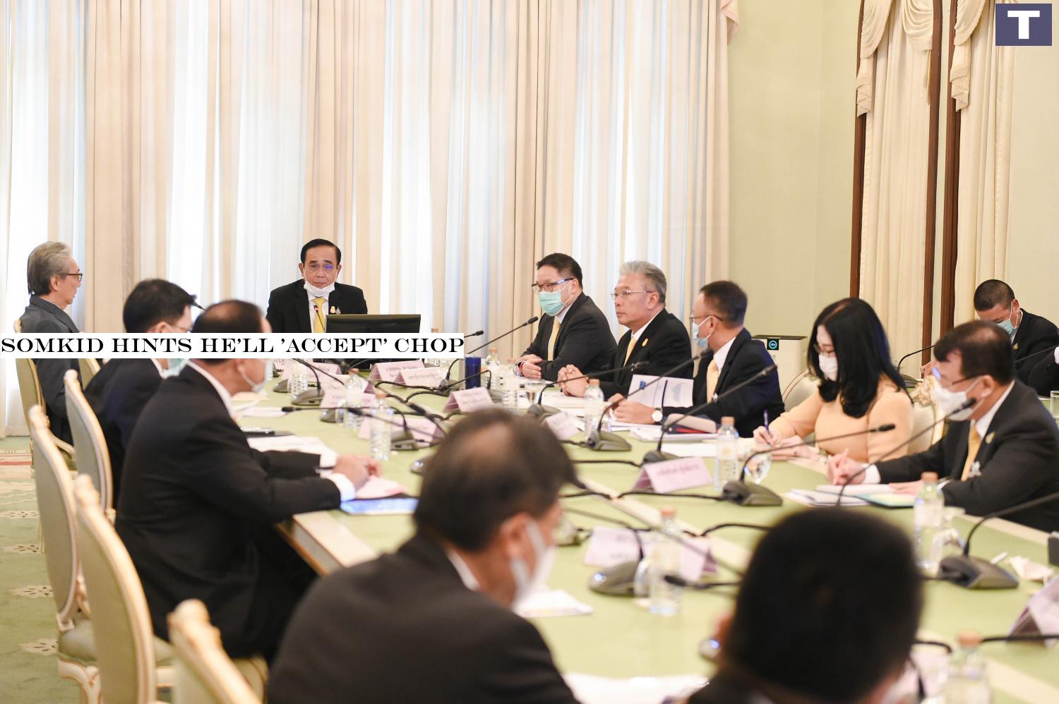 Prime Minister Prayut Chan-o-cha is flanked by Deputy Prime Minister Somkid Jatusripitak, left, and Finance Minister Uttama Savanayana as he chairs the meeting of economic advisers to discuss measures to speed up economic recovery after the Covid-19 pandemic at Government House. Mr Uttama who last month was ousted as leader of the ruling Palang Pracharath Party, resigned from the party on Thursday.â-#128;-#137;â-#128;-#137;the Government House Somkid hints he'll 'accept' chop