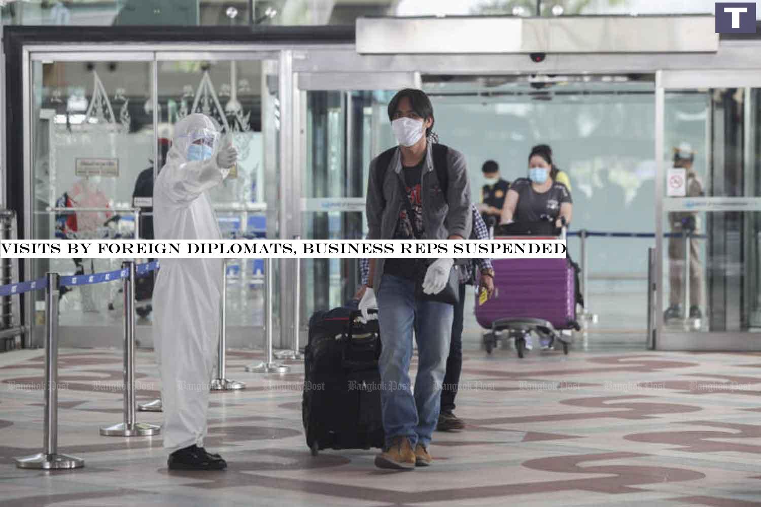 A disease control official directs returnees at Bangkok's Suvarnabhumi airport. The government has suspended the arrivals of privileged foreign visitors following the discovery of Covid-19 infection in the Sudanese attache's family after they arrived from Khartoum. (Photo: Arnun Chonmahatrakool) Visits by foreign diplomats, business reps suspended