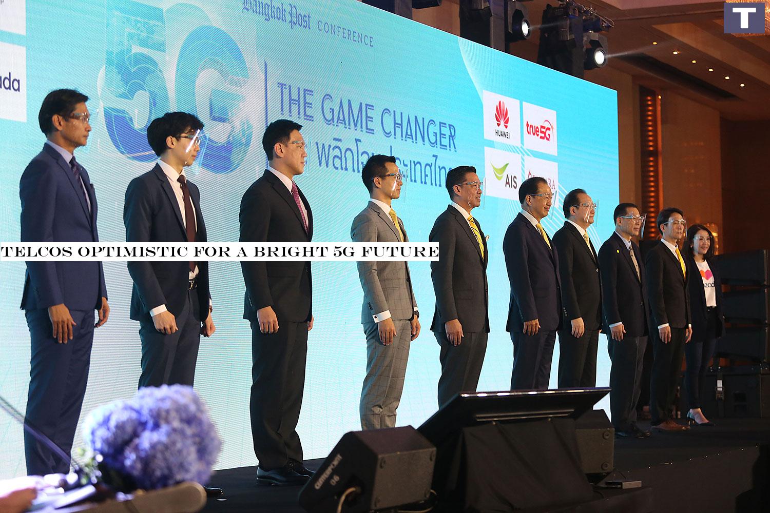 Speakers and executives line up for a group photo session at the Bangkok Post Conference 2020 '5G: The Game Changer'. From left: Krisda Utamote, director of corporate communications of BMW Group Thailand; Kantapong Chanthanawan, vice president of Digital Health Transformation of Thonburi Healthcare Group; Woragarn Likhitdechasakdi, deputy chief technology officer of Carrier Network, Huawei Technologies (Thailand) Co Ltd; Abel Deng, chief executive officer, Huawei Technologies (Thailand) Co Ltd; Buddhipongse Punnakanta, Minister of Digital Economy and Society; Worachai Bhicharnchitr, vice chairman of the Board of Directors of the Bangkok Post; Vichaow Rakphongphairoj, executive vice -chairman of True Corporation Plc; Ronnachit Mahattanapreut, director and member of the executive committee of the Bangkok Post; Pratthana Leelapanang, chief consumer business officer of Advanced Info Services Plc; and Thanida Suiwatana, chief business officer of Lazada Thailand.(Photo: Varuth Hirunyatheb) Telcos optimistic for a bright 5G future