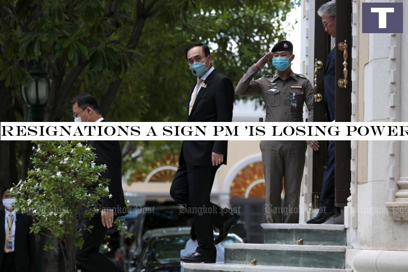 Prime Minister Prayut Chan-o-cha looks at an army of reporters as he is leaving Government House on Friday. (Photo by Chanat Katanyu) Resignations a sign PM 'is losing power'