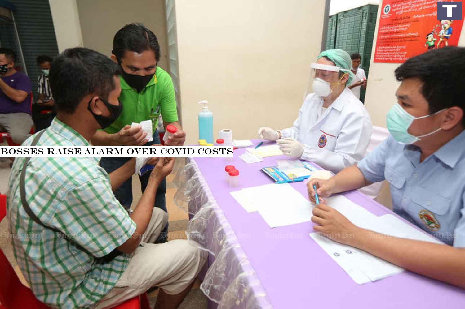 Health volunteers take part in an activity to raise awareness about Covid-19 among migrant labourers in Muang district in Samut Sakhon province in April. (Photo: Varuth Hirunyatheb) Bosses raise alarm over Covid costs