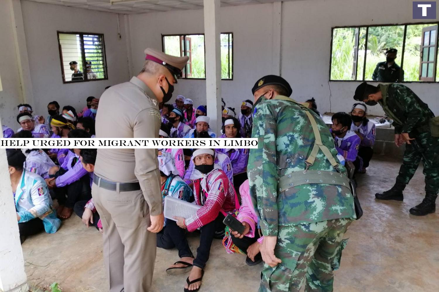 Police and military officers question some of the 78 ethnic-Karen people who were caught after crossing from a neighbouring country and charged with illegal entry in Thong Pha Phum district of Kanchanaburi on July 19. Help urged for migrant workers in limbo