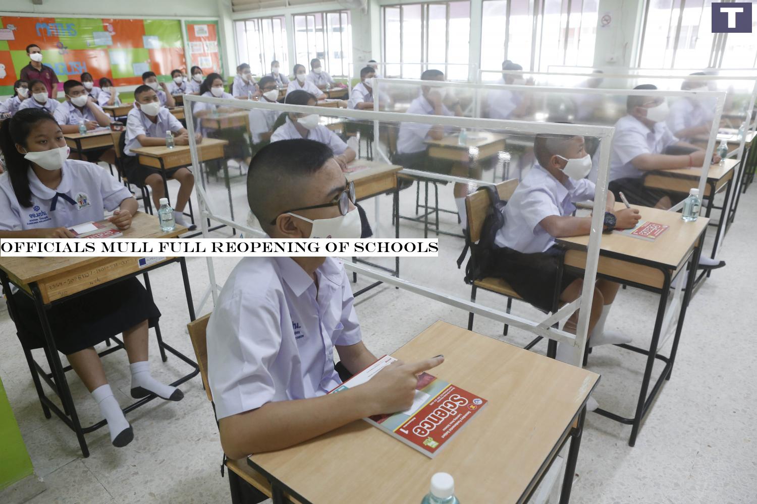 This July 1 photo shows students at Prachaniwet School in Bangkok's Chatuchak district observing social distancing.â-#128;-#137;Pattarapong Chatpattarasill Officials mull full reopening of schools