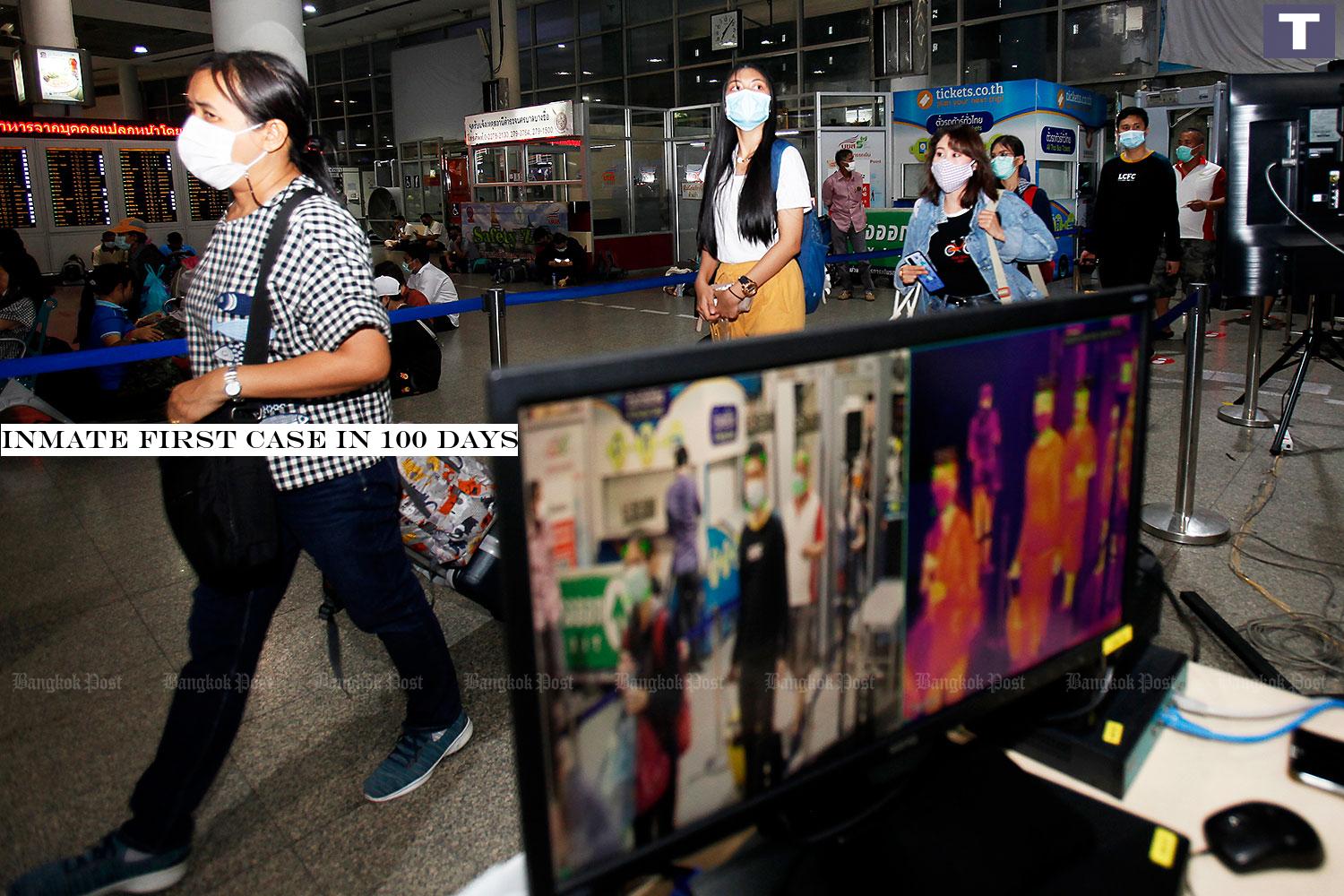 On the lookout: People walk past a thermal scanner as they make their way into the terminal at the Mor Chit bus depot in angkok yesterday. The state-owned Transport Company announced it was putting more inter-provincial buses into service during the long weekend to cope with the exodus of holidaymakers. (Photo by Nutthawat Wicheanbut) Inmate first case in 100 days