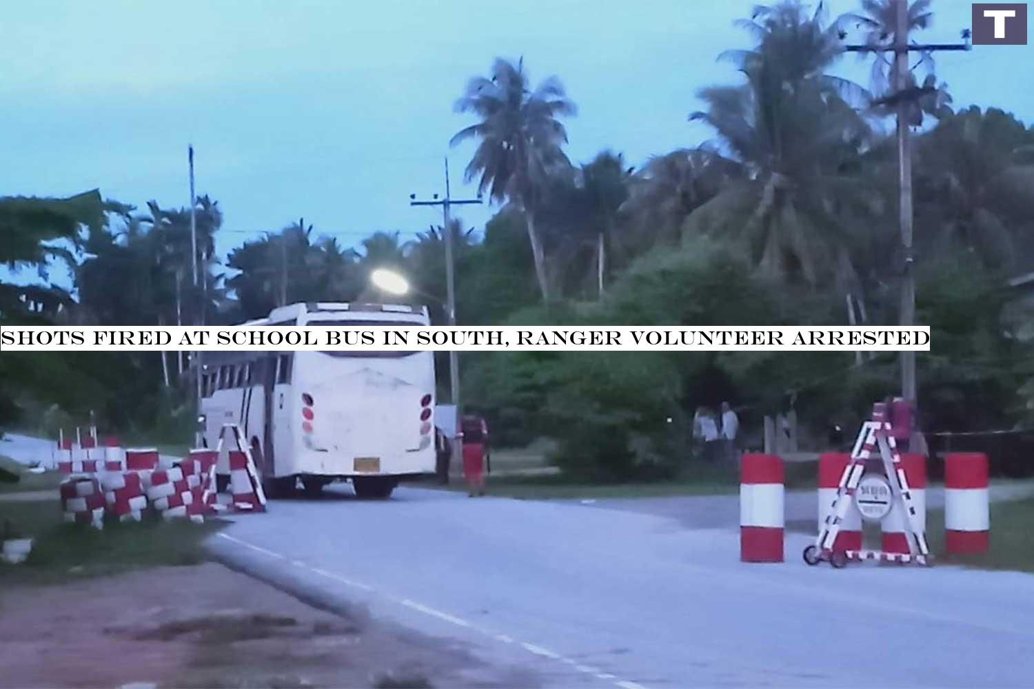 The school bus operated by a private Islamic school, parked at a military checkpoint in Yaring district, Pattani, after being hit by three shots fired by a ranger on Thursday evening. Nobody was injured. (Photo: Abdullah Benjakat) Shots fired at school bus in South, ranger volunteer arrested