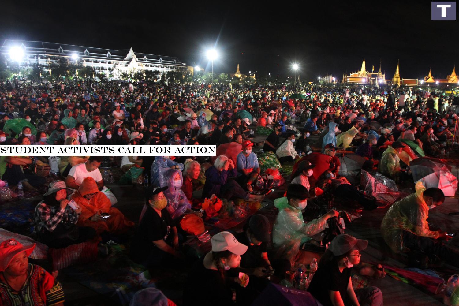 packing a punch: Pro-democracy activists fill Sanam Luang, rally site of the two-day protest organised by the United Front of Thammasat and Demonstration, as evening fell. The rally began near Thammasat University's Tha Prachan campus before moving to Sanam Luang yesterday. Student activists call for action
