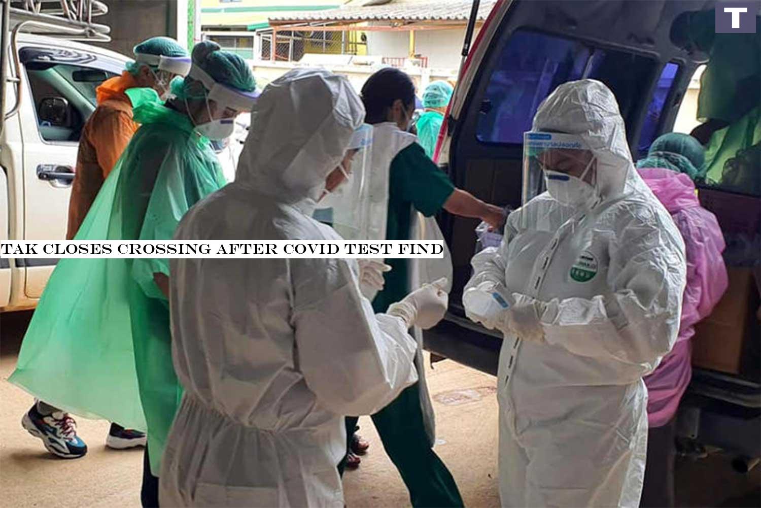 Health officials go to a warehouse and a fresh market in Mae Sot district of Tak province on Sunday to track people in contact with two Myanmar lorry drivers who were found to be infected with Covid-19. (Photo by Assawin Pinitwong) Tak closes crossing after Covid test find