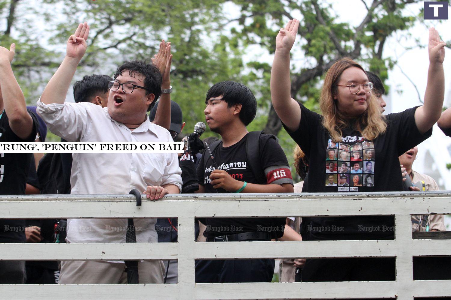 Parit 'Penguin' Chiwarak (left) and Panusaya 'Rung' Sithijirawattanakul during the really on Sept 19 at Sanam Luang. (Photo by Wichan Charoenkiatpakul) 'Rung', 'Penguin' freed on bail