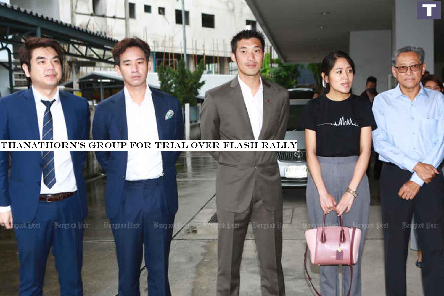 From left, Piyabutr Saengkanokkul, Pita Limjaroenrat, Thanathorn Juangroongruangkit, Pannika Wanich and Pairattachote Chantarakajon, at the Office of Summary Litigation Region 6 in Pathumwan district, Bangkok, to hear the indictment decision on Thursday. (Photo: Somchai Poomlard) Thanathorn's group for trial over flash rally