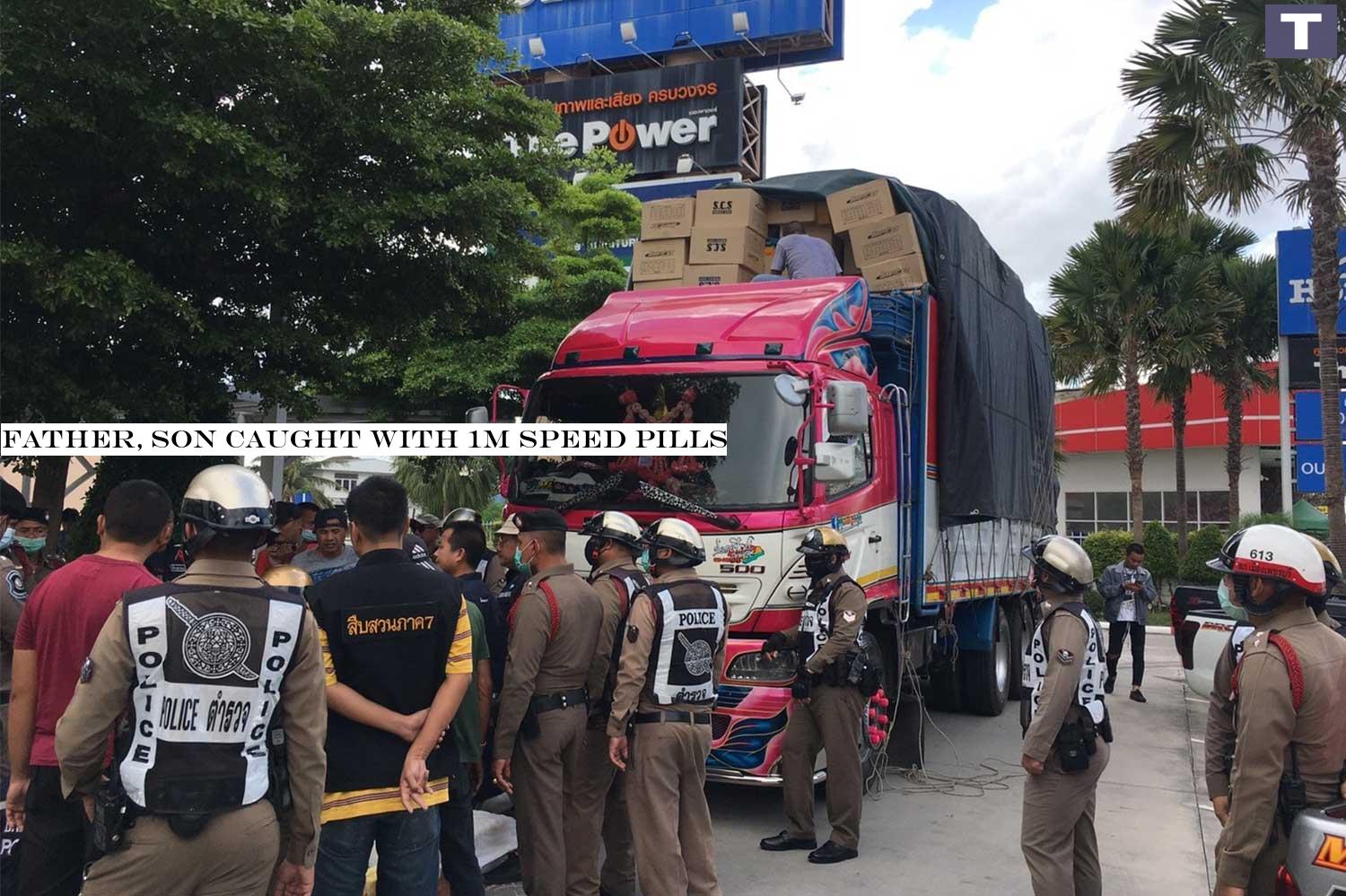 Police officers search a 10-wheel truck loaded with cardboard boxes of goods and find two sacks containing one million speed pills hidden in the truck roof at a road checkpoint on southbound Phetkasem Road in Muang district of Phetchaburi on Saturday morning. (Photo: @policetv.tv Facebook page) Father, son caught with 1m speed pills